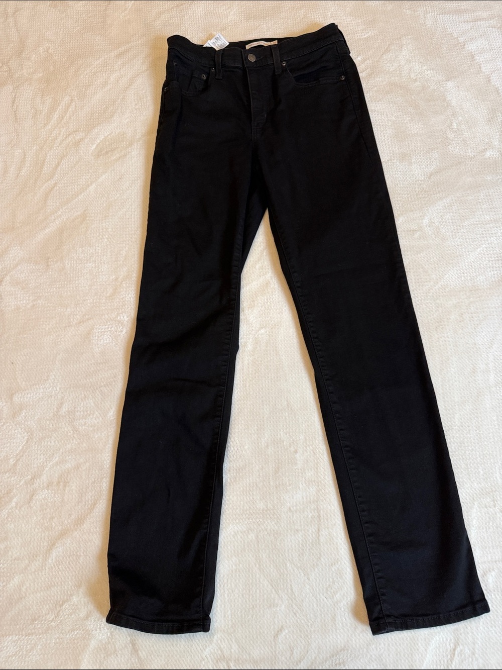 Women’s Levi’s black 724 high rise straight jeans. 30 W, 32 length. Stretchy!